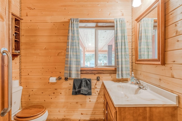 2237 Grave Creek Rd, Eureka, MT 59917 - bathroom with wooden walls and vanity