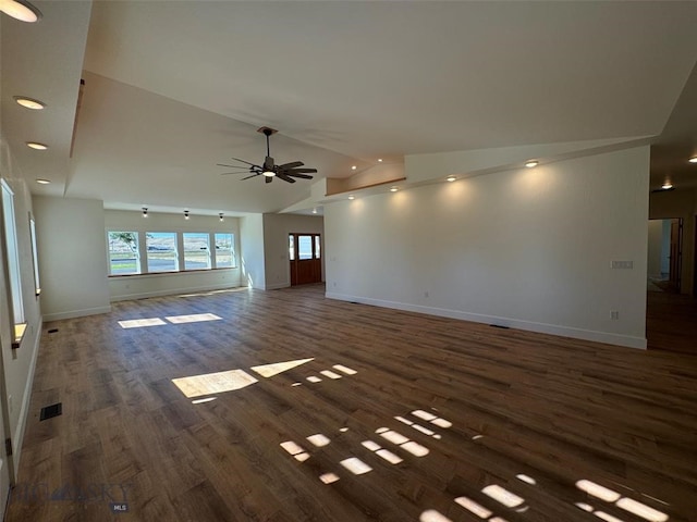 unfurnished living room featuring ceiling fan, dark hardwood / wood-style floors, and high vaulted ceiling