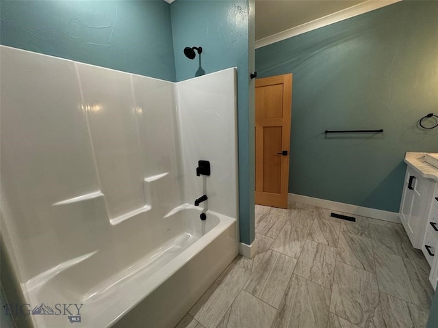 bathroom with shower / washtub combination and vanity