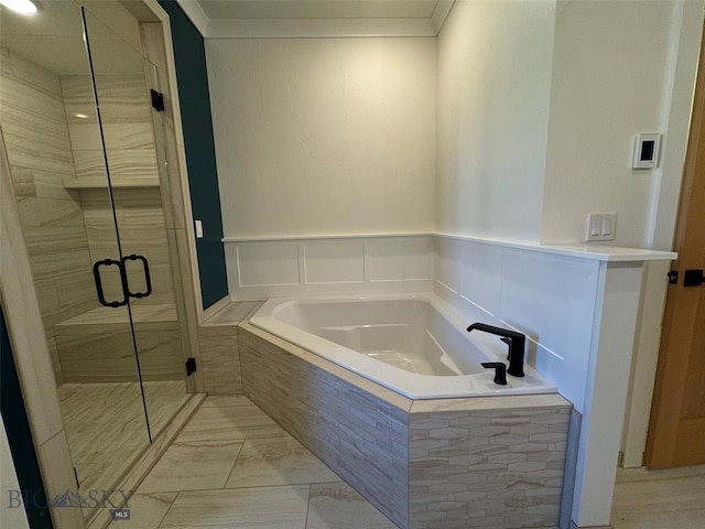 bathroom featuring plus walk in shower and crown molding