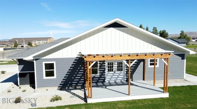 back of house featuring a pergola and a patio area