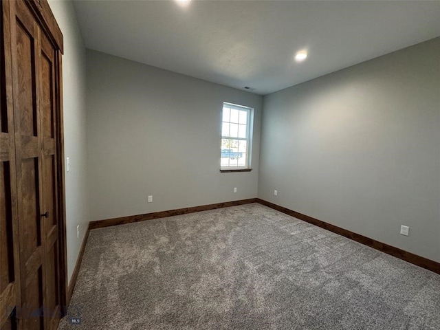 unfurnished bedroom with carpet