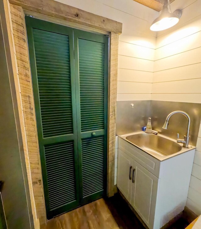 basement with fridge and wood ceiling