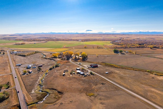 bird's eye view featuring a mountain view and a rural view