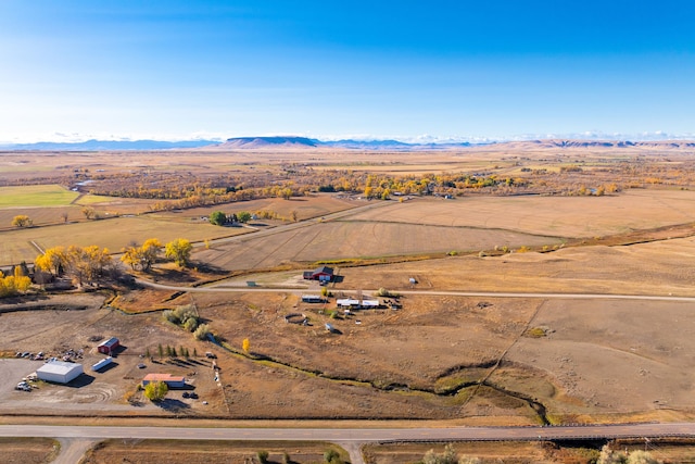 bird's eye view with a rural view and a mountain view