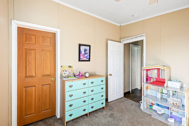 playroom featuring crown molding and carpet floors