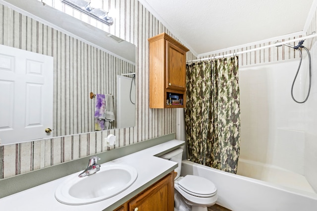 full bathroom featuring vanity, shower / tub combo, a textured ceiling, and toilet