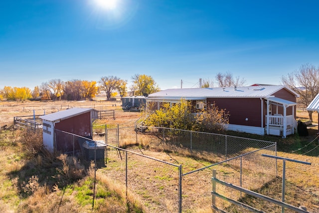 view of yard with a rural view