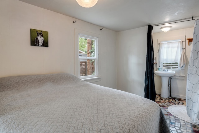 bedroom with sink