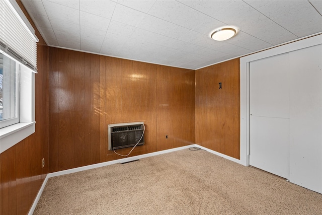 161 3rd Ave, Kalispell, MT 59901 - empty room with carpet flooring, wooden walls, and heating unit