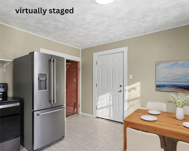 161 3rd Ave, Kalispell, MT 59901 - kitchen with stainless steel fridge with ice dispenser, electric stove, and a textured ceiling