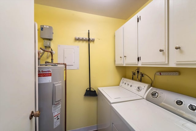 washroom with cabinet space, electric water heater, independent washer and dryer, and electric panel