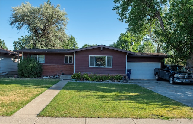 ranch-style home featuring a front yard and a garage