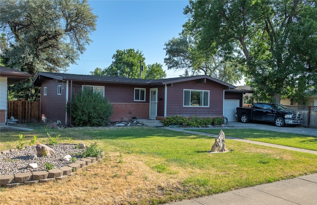 ranch-style home with a front lawn