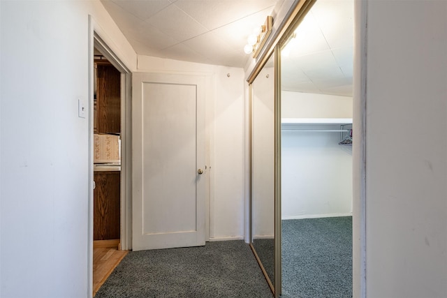 corridor featuring carpet