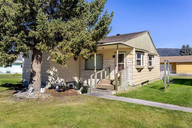 bungalow with a front lawn