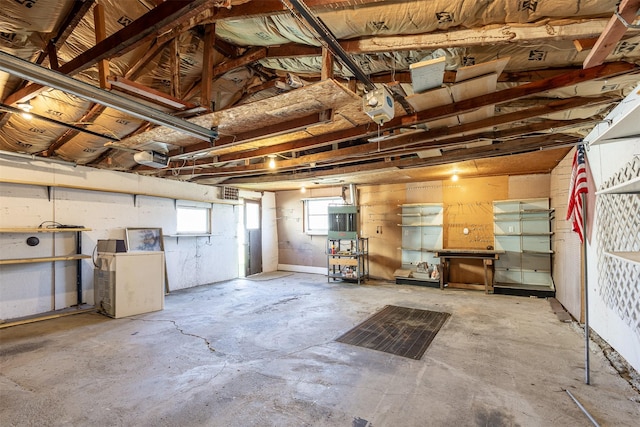 below grade area featuring water heater