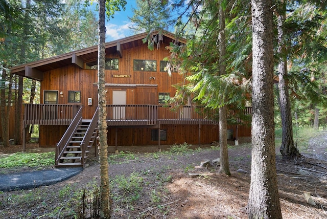 114 Cedar Way Unit 114, Whitefish, MT 59937 - rear view of house with stairway and a wooden deck