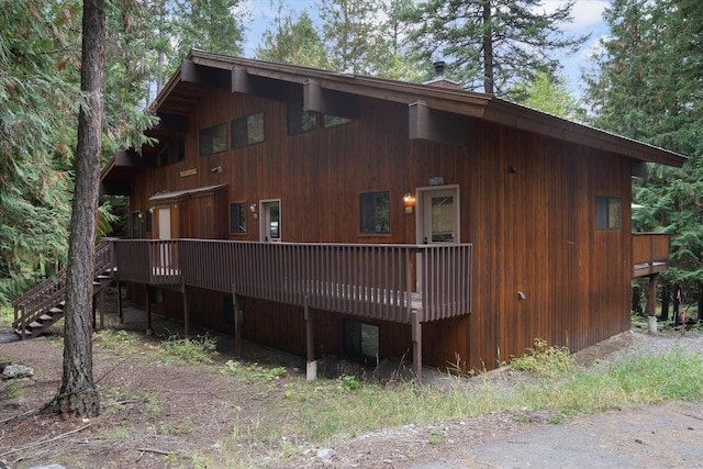 114 Cedar Way Unit 114, Whitefish, MT 59937 - view of property exterior featuring a wooden deck and stairway