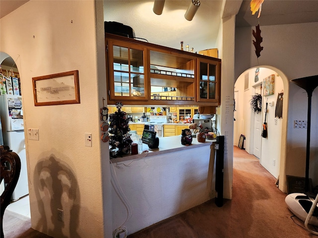 interior space featuring light carpet and white electric range oven