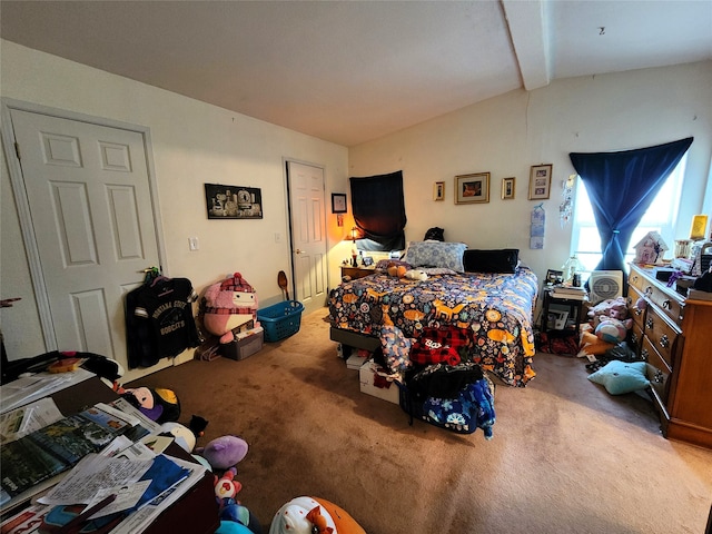 carpeted bedroom featuring lofted ceiling with beams