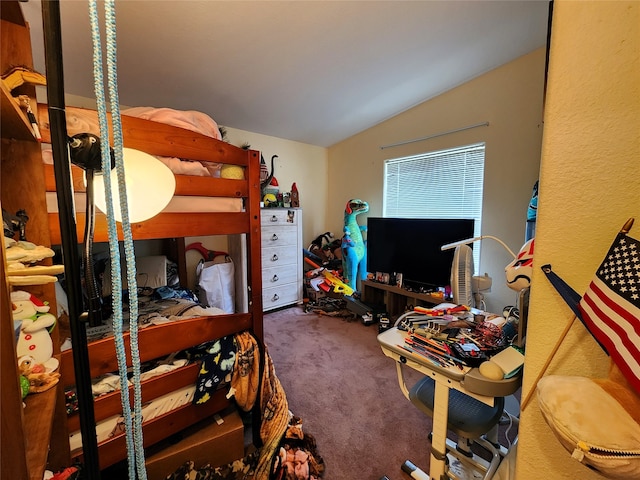 bedroom featuring carpet and vaulted ceiling