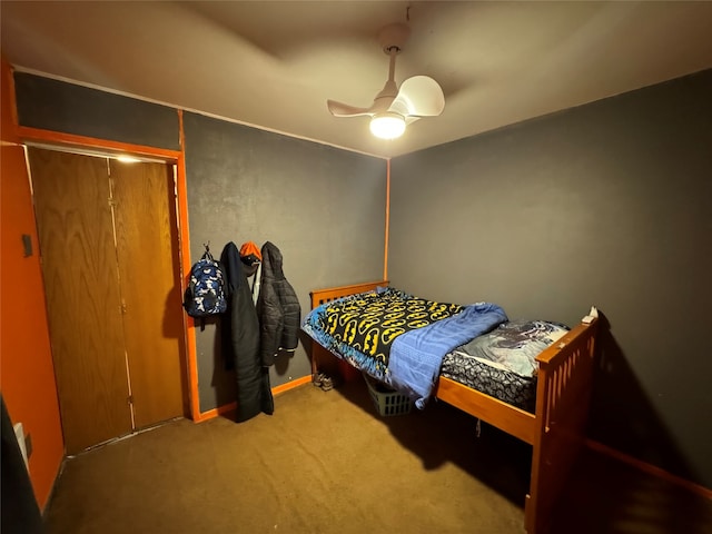 bedroom featuring ceiling fan and carpet flooring