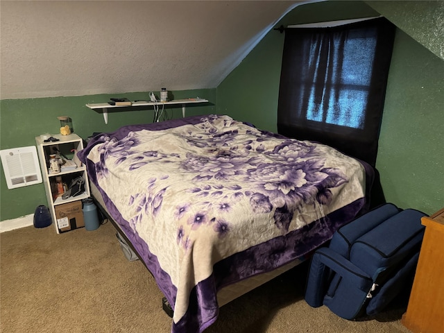 carpeted bedroom featuring lofted ceiling and a textured ceiling