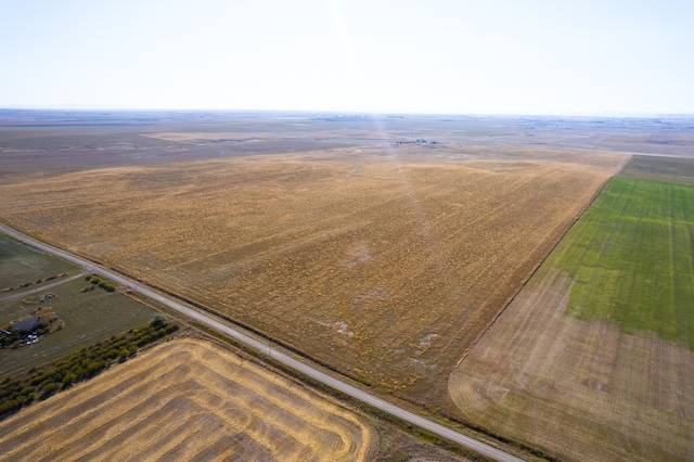 birds eye view of property featuring a rural view