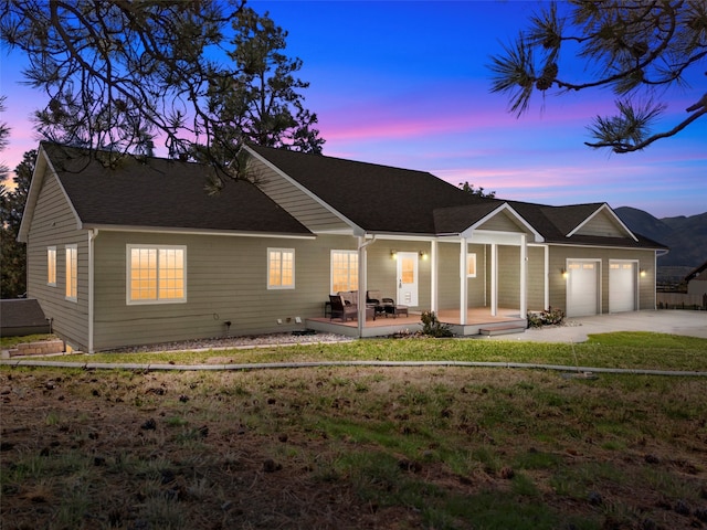 ranch-style house featuring a lawn