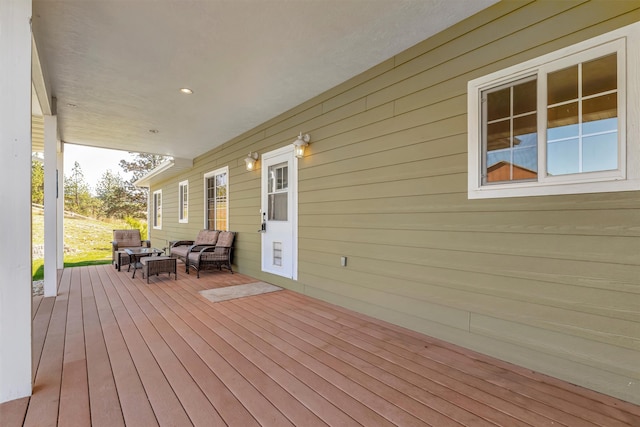 deck with an outdoor hangout area