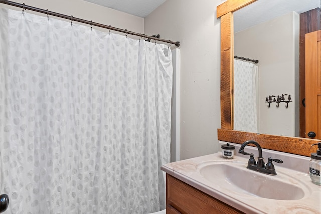 1200 Shaw Ln, Bonner, MT 59823 - full bath with vanity and a shower with shower curtain
