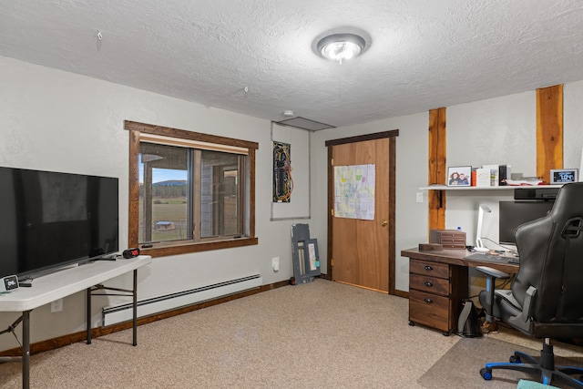 office space featuring a baseboard radiator, a textured ceiling, and light colored carpet