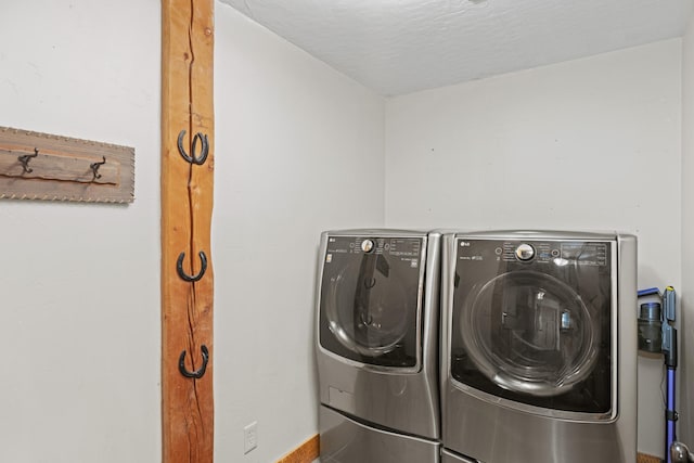 1200 Shaw Ln, Bonner, MT 59823 - laundry room featuring separate washer and dryer