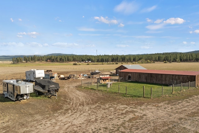 birds eye view of property with a rural view