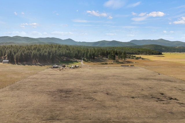 view of mountain feature with a rural view