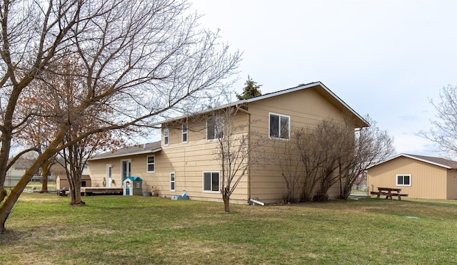 view of home's exterior with a yard