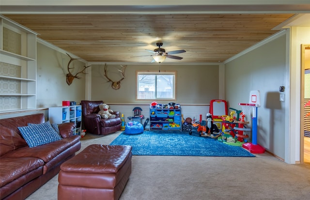 game room with ceiling fan, wood ceiling, and crown molding