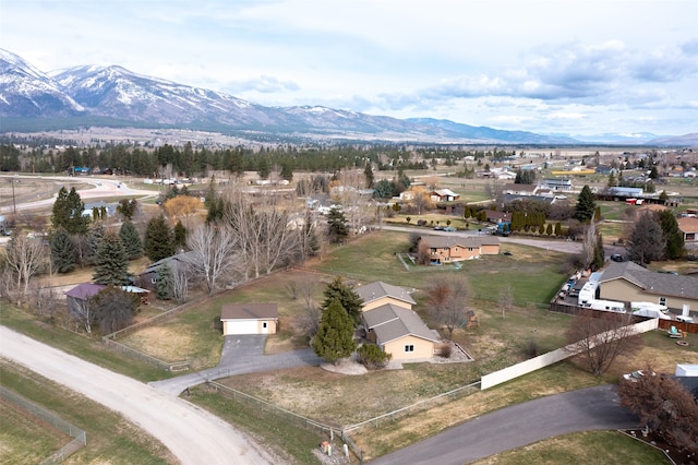 birds eye view of property featuring a mountain view