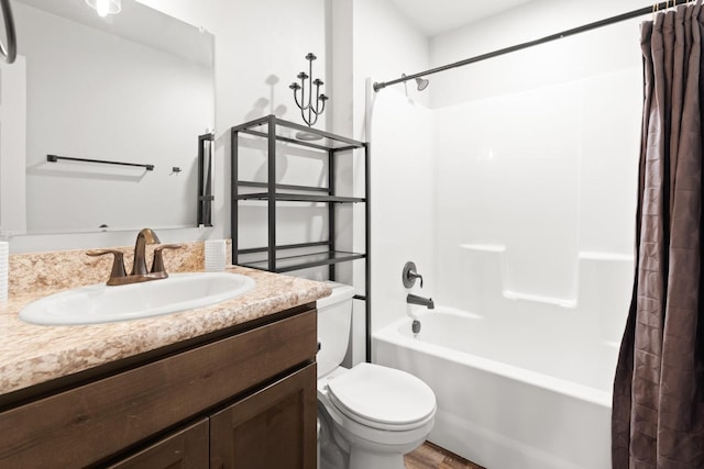 bathroom with wood finished floors, shower / tub combo with curtain, vanity, and toilet