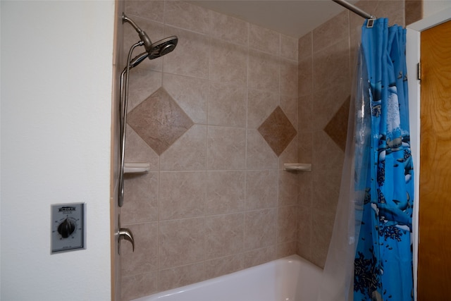 bathroom with shower / bathtub combination with curtain