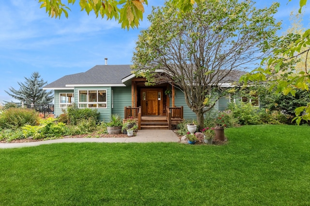 view of front of home with a front yard