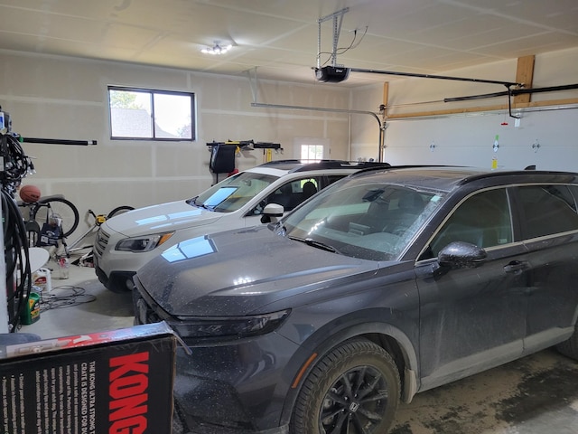 garage featuring a garage door opener