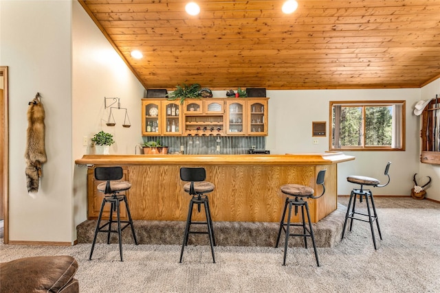 155 Grandview Ln, Seeley Lake, MT 59868 - indoor wet bar with wooden ceiling, light carpet, baseboards, recessed lighting, and vaulted ceiling