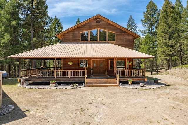155 Grandview Ln, Seeley Lake, MT 59868 - view of front of house featuring covered porch and metal roof