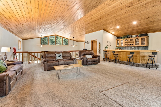 155 Grandview Ln, Seeley Lake, MT 59868 - living area with vaulted ceiling, carpet floors, wood ceiling, and bar area