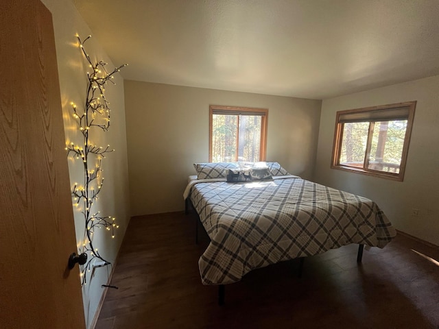 bedroom with multiple windows