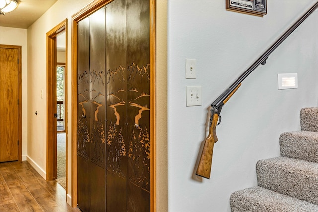 155 Grandview Ln, Seeley Lake, MT 59868 - entrance foyer featuring stairs, wood finished floors, and baseboards