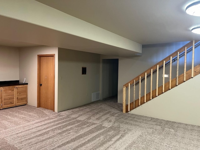 basement with carpet floors