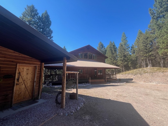 exterior space with covered porch